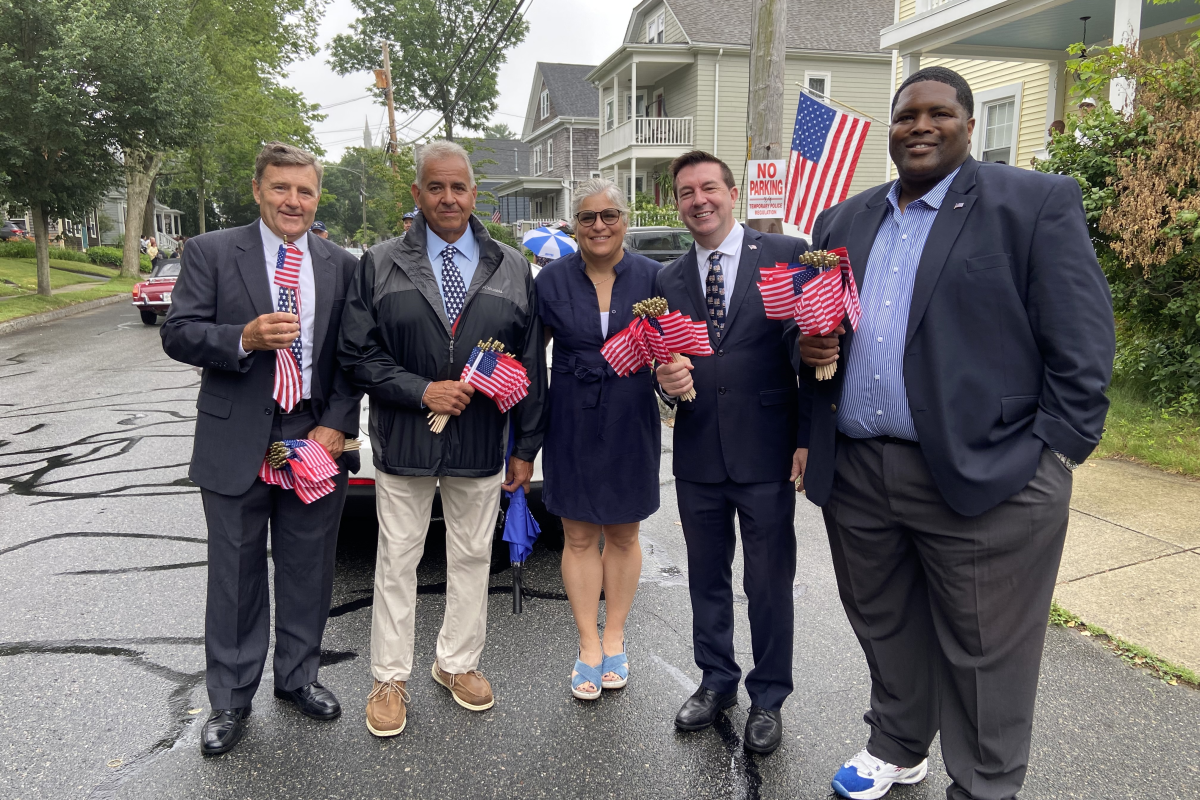 Select Board member Bob Espindola, member Keith Silvia, Clerk Stasia Powers, Vice-Chair Charlie Murphy and Chair Leon Correy along the parade route